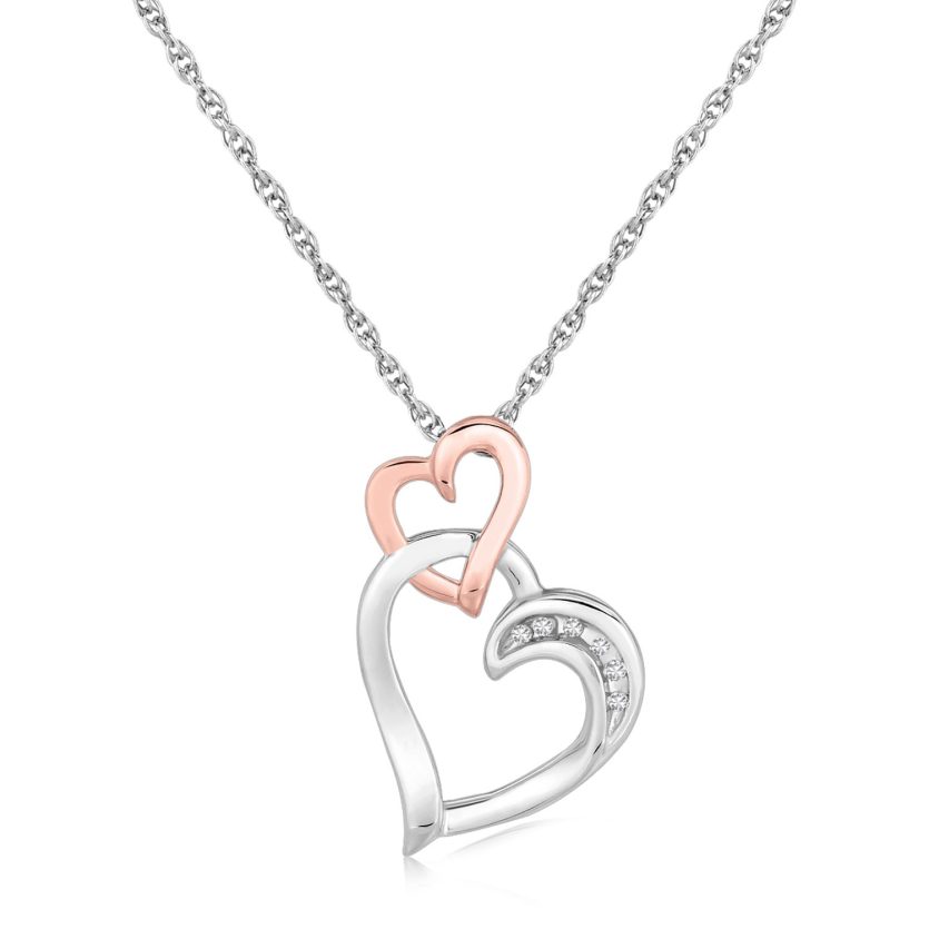 Sterling Silver Cascading Dual Heart Diamond Accented Pendant (.02 cttw) - Image 1